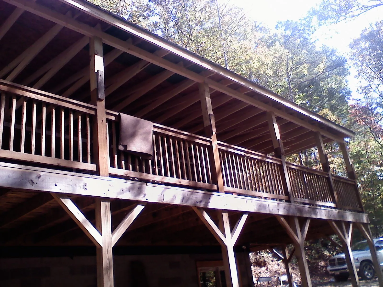 Timber framing under a new elevated porch and deck — Roof Leak Repair in New Pine Creek by Roofing Brothers